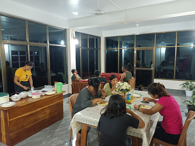 Joyful Dining Moments at Sarangdu Homestay - Guests savoring the best homestay experience in Meghalaya