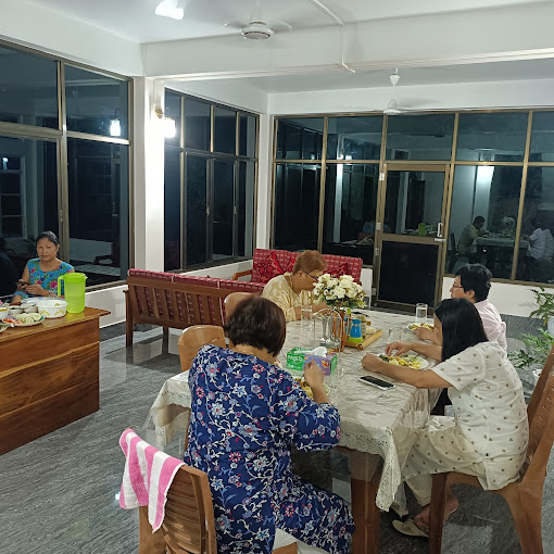 Savoring Meghalaya's Flavors - Guests at Sarangdu Homestay Enjoying Dinner Together