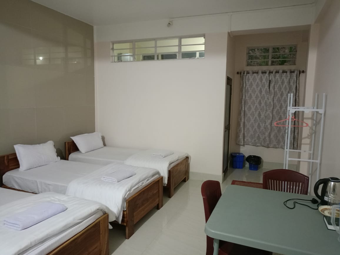 Cozy bedroom interior at Sarangdu Homestay, Baghmara, Meghalaya.